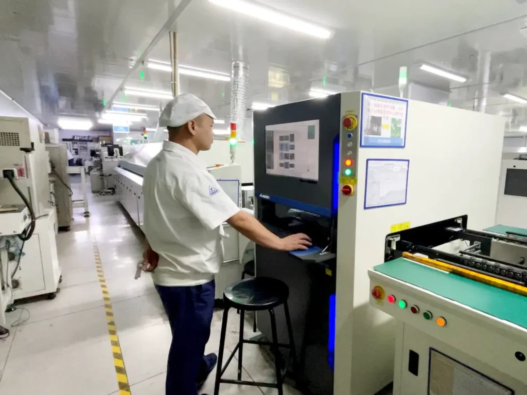Automated optical inspection system performing quality control during industrial router manufacturing